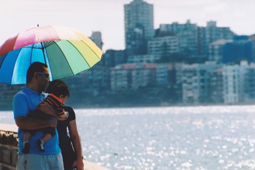 Sydney-Street-Photography---Family-Together-with-Rainbow-Umbrella